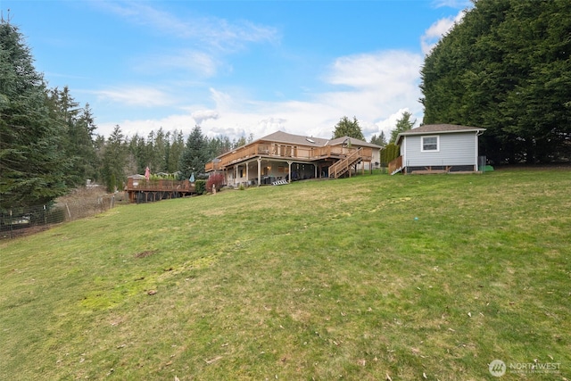 view of yard with a deck