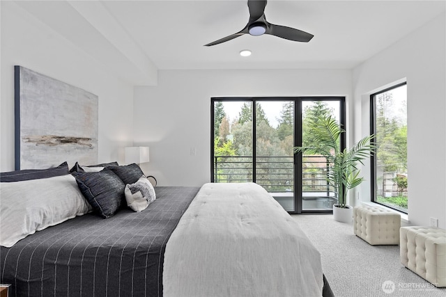 bedroom with carpet floors, access to exterior, and ceiling fan