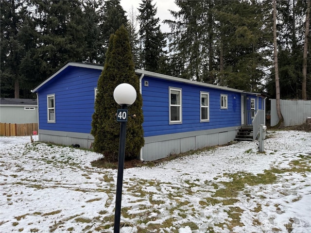 view of snow covered property