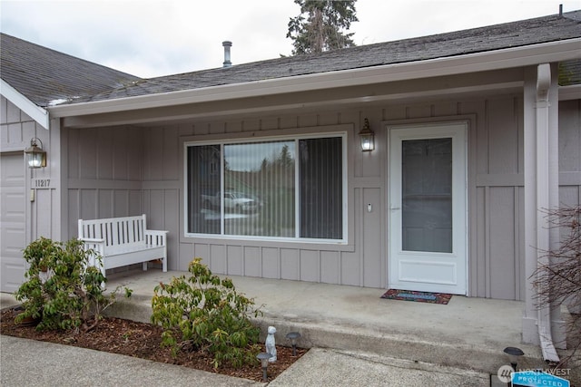 property entrance with a garage