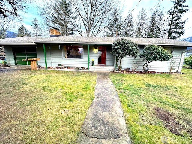 single story home with roof with shingles, a chimney, and a front lawn