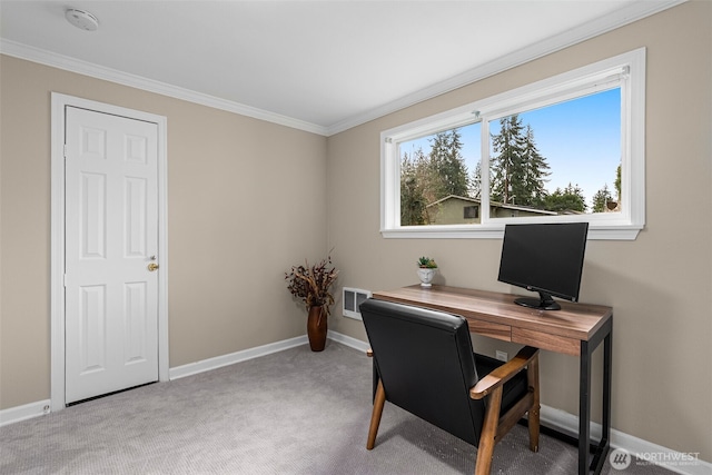 home office with carpet flooring, baseboards, and ornamental molding