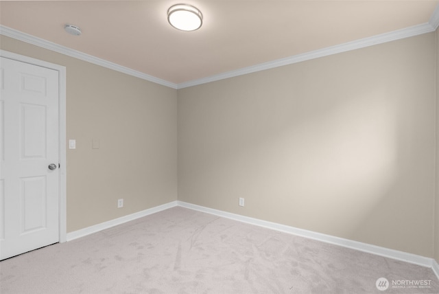 unfurnished room featuring baseboards, light colored carpet, and ornamental molding