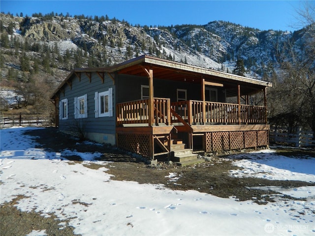 view of front of home with a mountain view