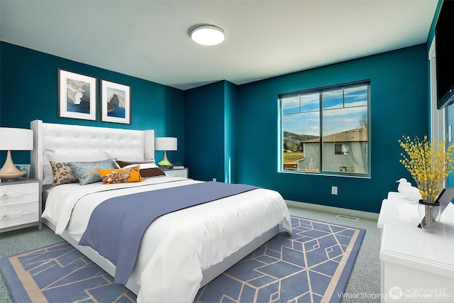 bedroom with carpet flooring, baseboards, and visible vents