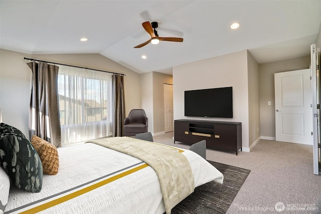 carpeted bedroom with a ceiling fan, recessed lighting, a closet, baseboards, and vaulted ceiling