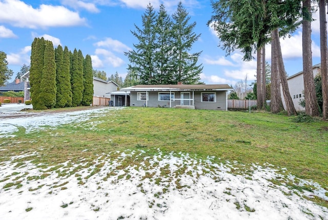 view of front of property with a front lawn