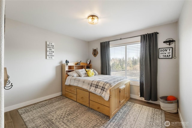 bedroom with light wood-type flooring