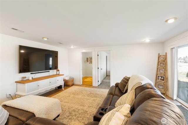 living room featuring light wood-type flooring