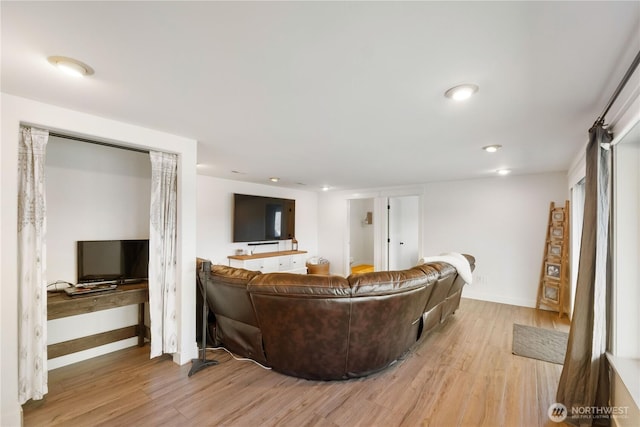 living room with light hardwood / wood-style floors