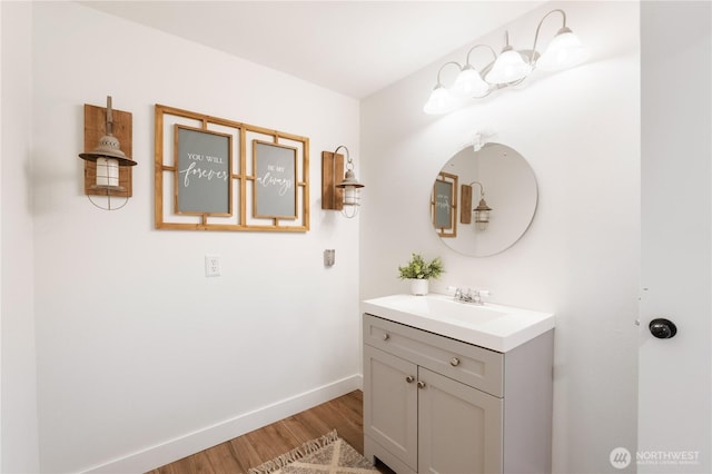 bathroom featuring vanity and hardwood / wood-style floors