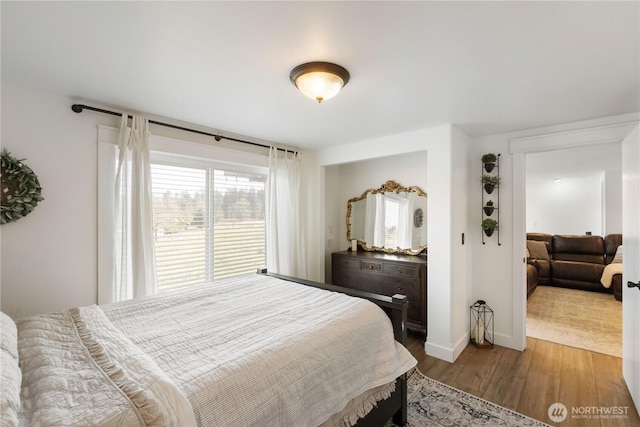 bedroom featuring hardwood / wood-style flooring