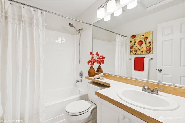 full bathroom featuring shower / bathtub combination with curtain, vanity, and toilet