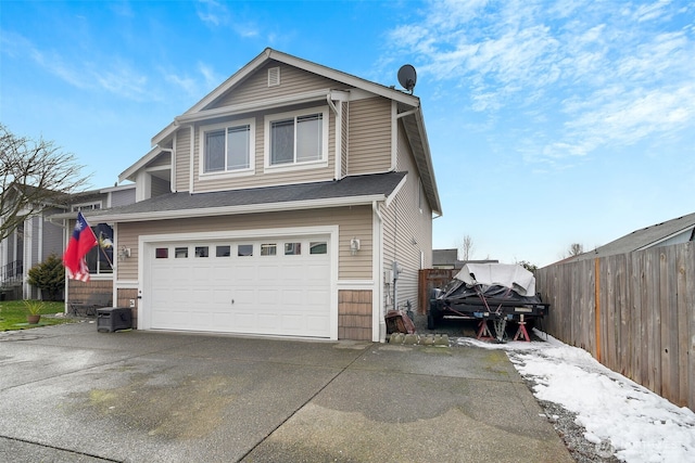 view of front of property featuring a garage