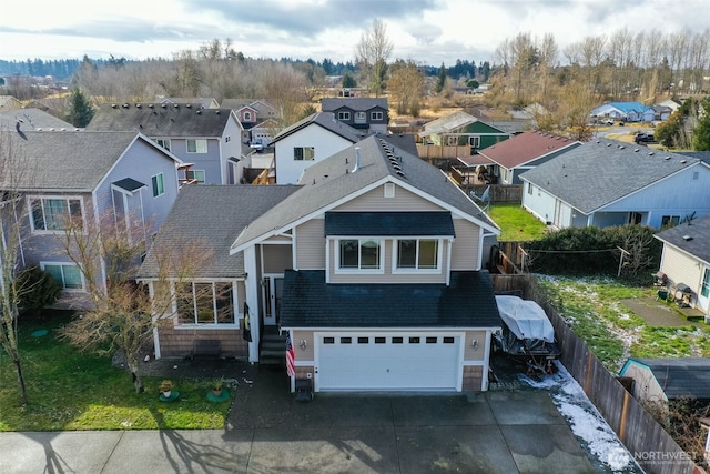 view of front of property with a garage