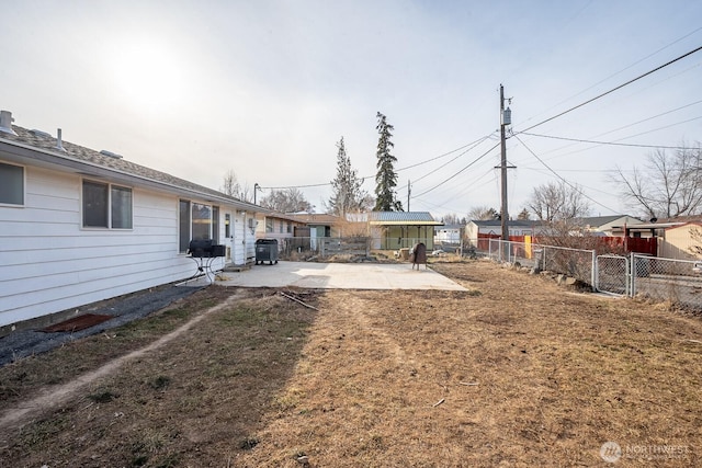 view of yard with a patio and central air condition unit