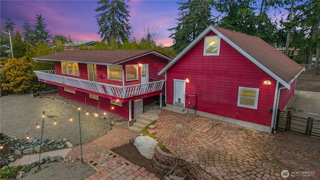 chalet / cabin with a patio area and fence