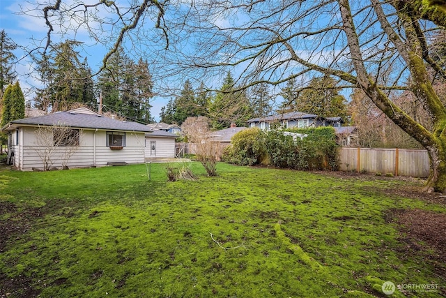 view of yard featuring fence