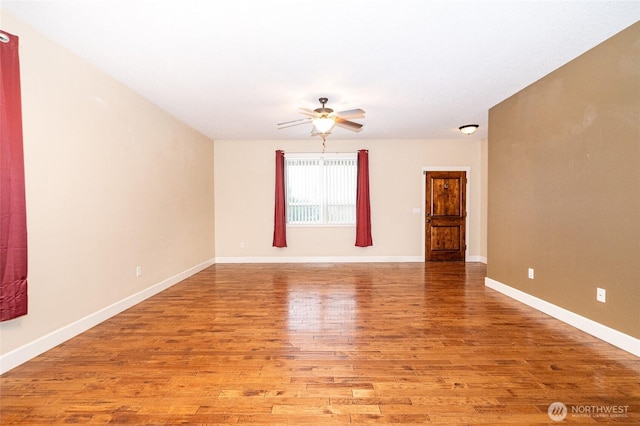 unfurnished room featuring ceiling fan and light wood-type flooring