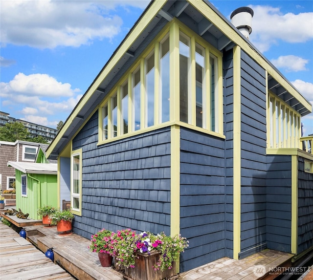 view of home's exterior with a deck