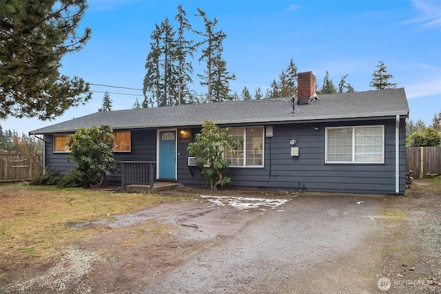 ranch-style home with a front yard