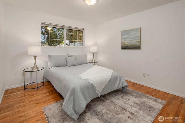 bedroom featuring hardwood / wood-style floors