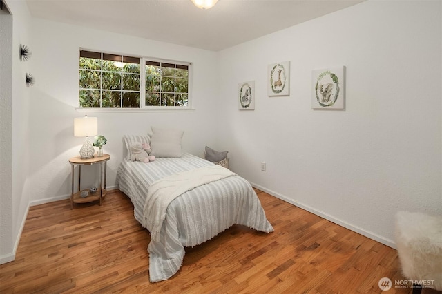 bedroom featuring hardwood / wood-style flooring