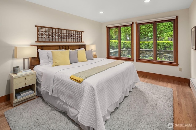 bedroom featuring light hardwood / wood-style floors