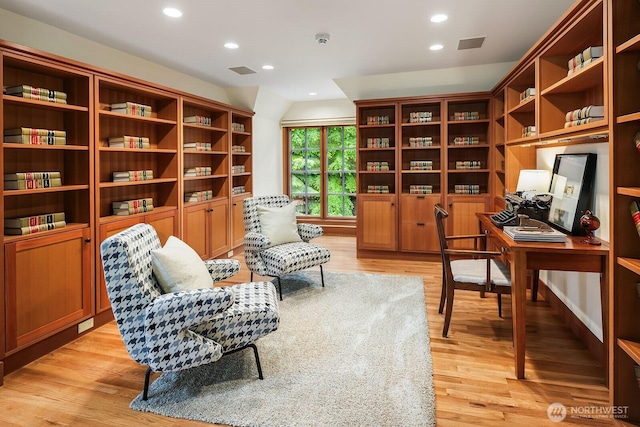 sitting room featuring light hardwood / wood-style floors