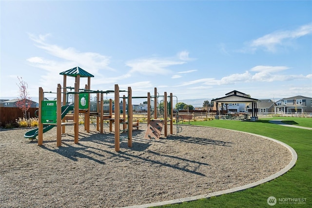 community jungle gym featuring a gazebo and a yard