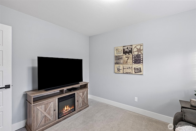 living room with carpet flooring and baseboards