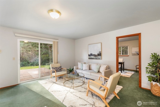 living room with dark colored carpet