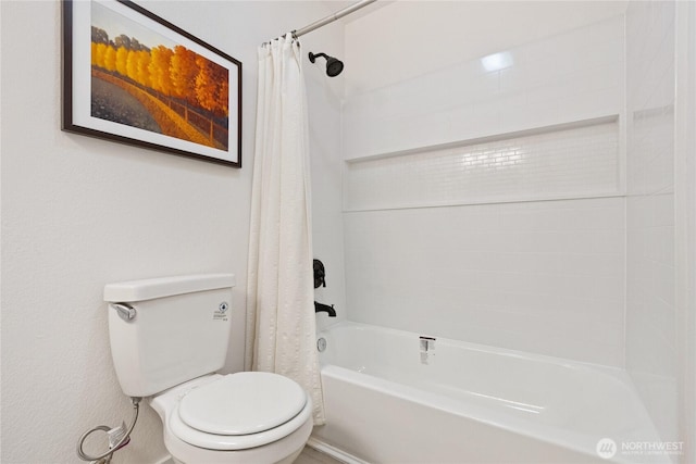 full bathroom featuring toilet and shower / bath combo