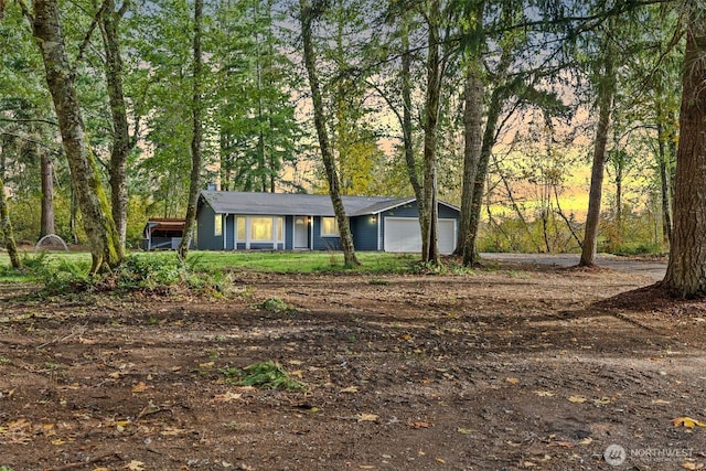 ranch-style home with a garage