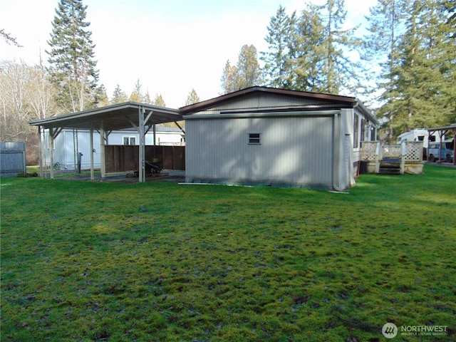 rear view of house with a yard