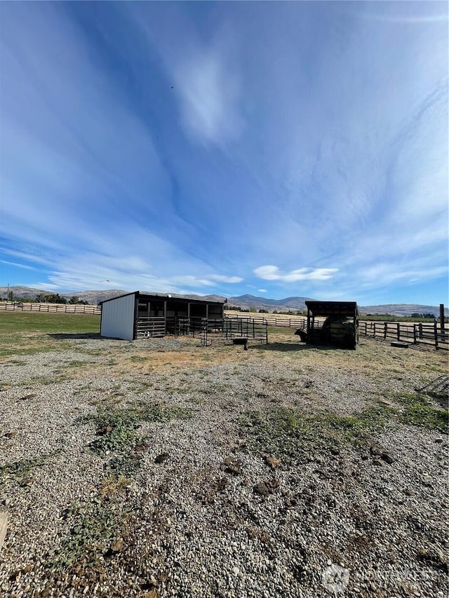 exterior space featuring a rural view