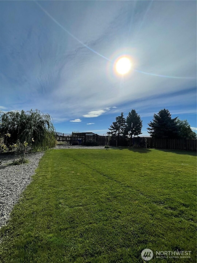 view of yard with fence