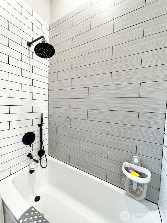 full bath featuring shower / washtub combination