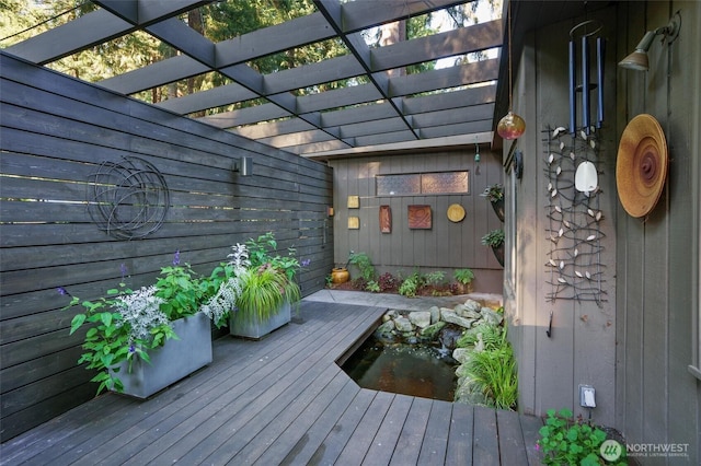 wooden deck with a pergola