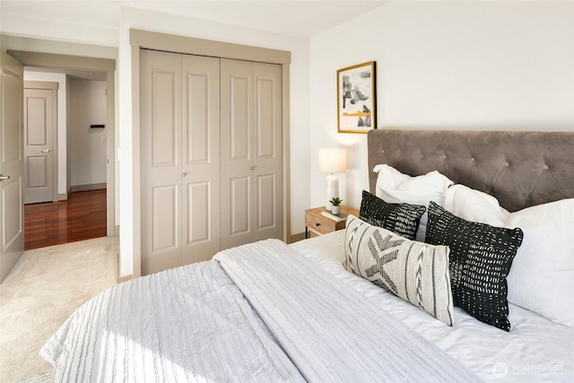 carpeted bedroom featuring a closet