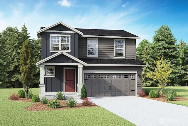 view of front of home with a front lawn and a garage