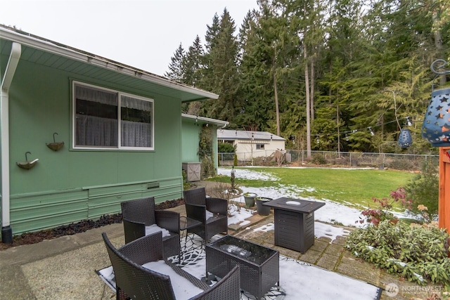 view of patio with an outdoor fire pit