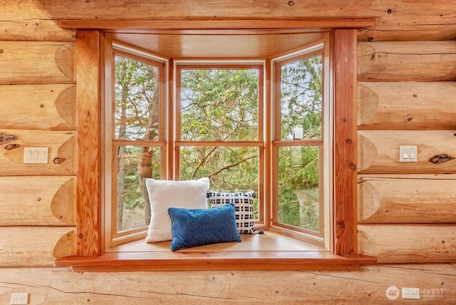 doorway featuring log walls