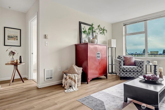 living area featuring light hardwood / wood-style floors