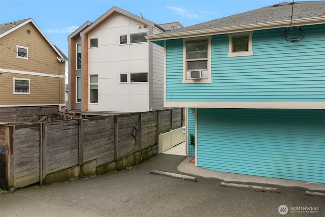 view of home's exterior with cooling unit