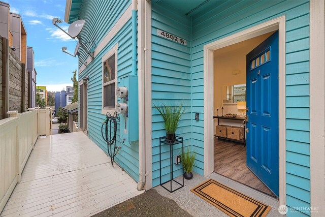 entrance to property featuring covered porch