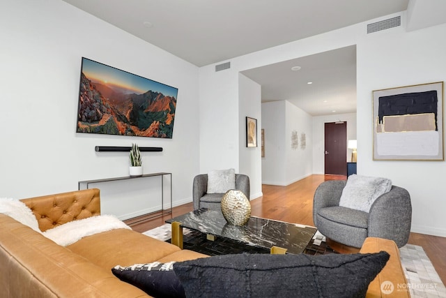 living room with wood-type flooring