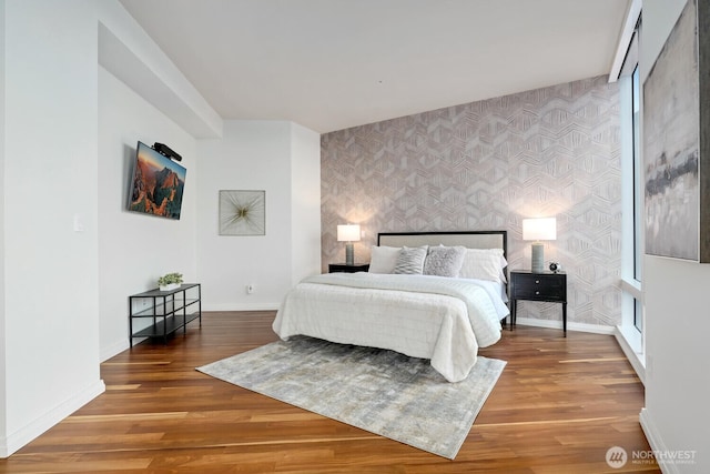 bedroom with hardwood / wood-style floors