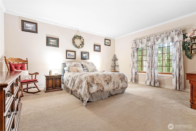 bedroom featuring ornamental molding, light carpet, and baseboards