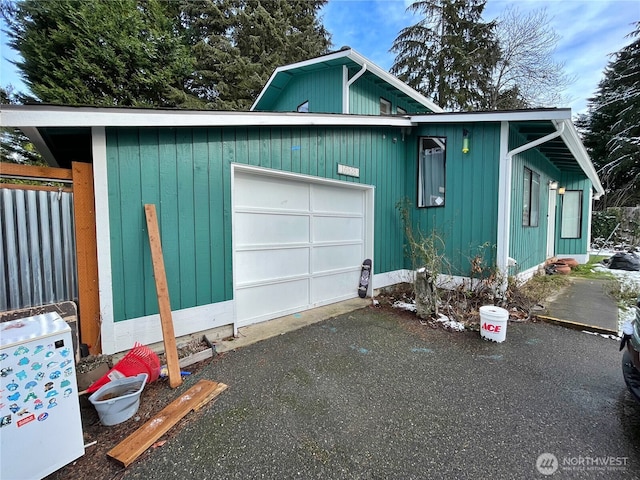 exterior space with a garage